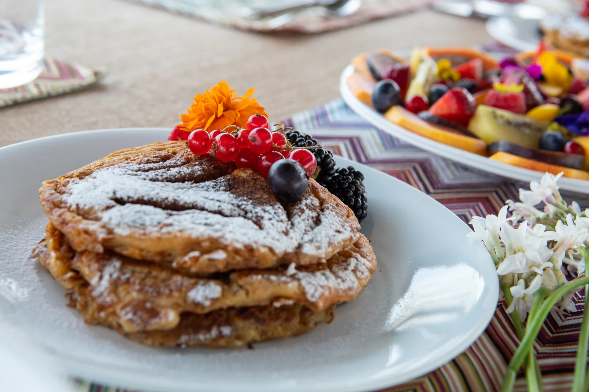 Homemade pancakes with fresh berries served aboard Sailing Yacht W